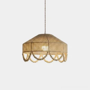 Hand-woven jute rope pendant light with draped wood bead garland, studio flat product shot on white background, natural beige finish, coastal boho design