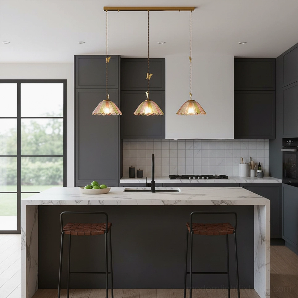 Handcrafted butterfly pendant lamp with gradient glass shade and brass hardware detail