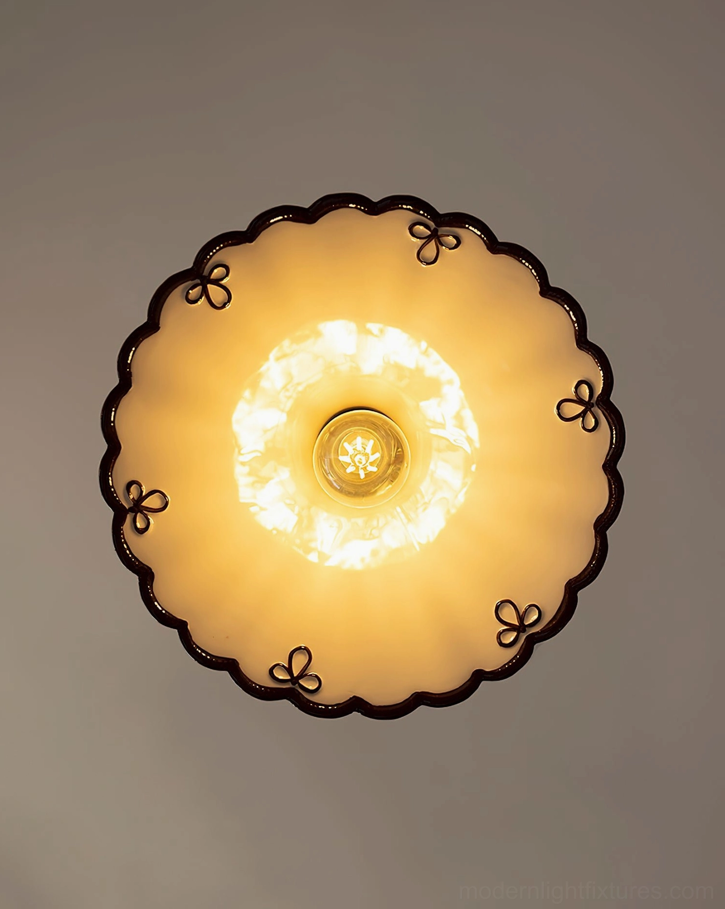 Handcrafted ceramic scalloped pendant fixture with warm brown and white color option, artistic detail view