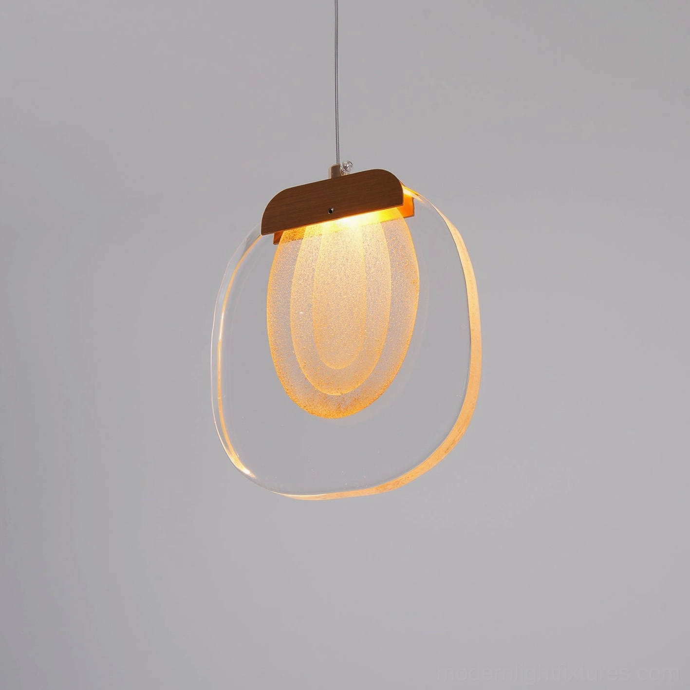 Handcrafted modern ripples pendant light with premium glass construction and gold accents