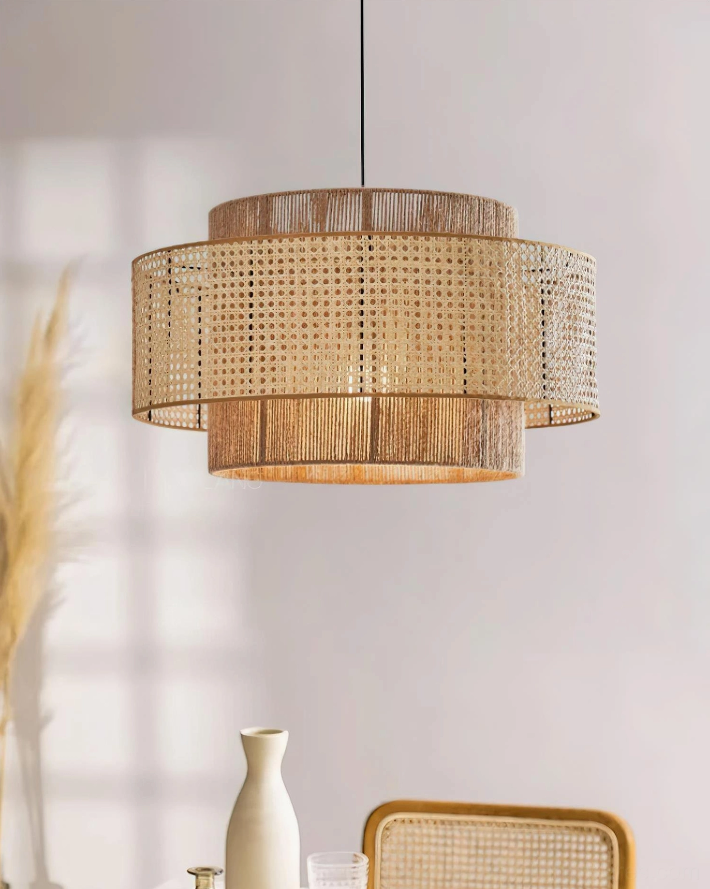 Handcrafted rattan weaving pendant lamp showing light brown colorway and warm tones in home interior setting