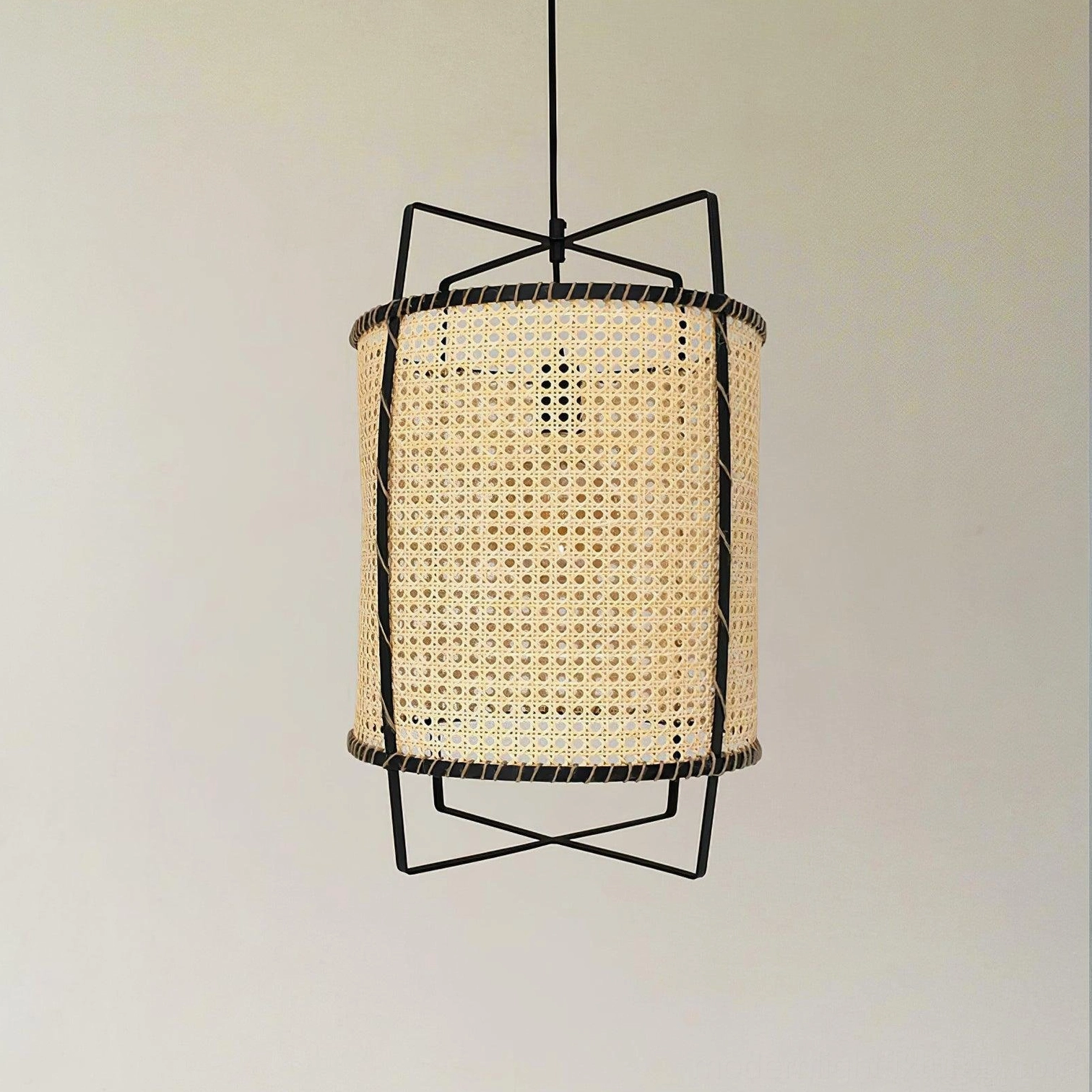 Handcrafted rattan pendant light showcasing artisanal weaving technique