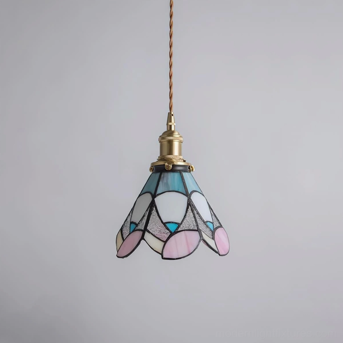 Handcrafted stained glass pendant light showing Arts and Crafts movement inspired design details