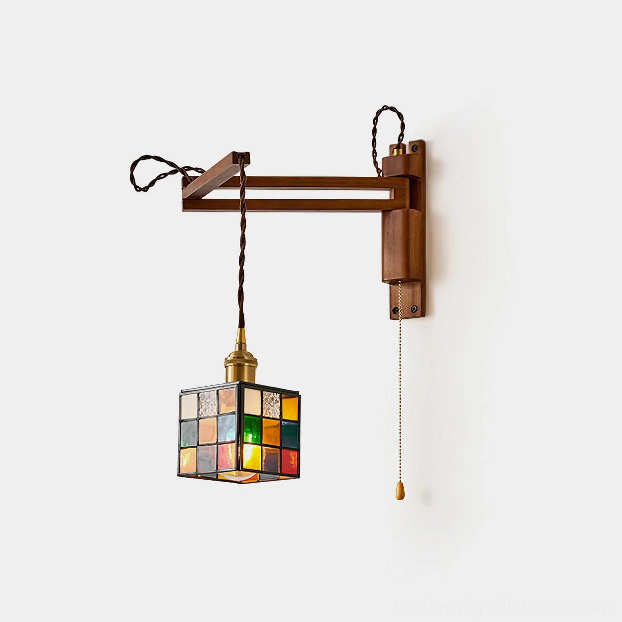 Handcrafted stained glass swing arm wall sconce with walnut wood frame and geometric grid shade in studio lighting, front view product photography