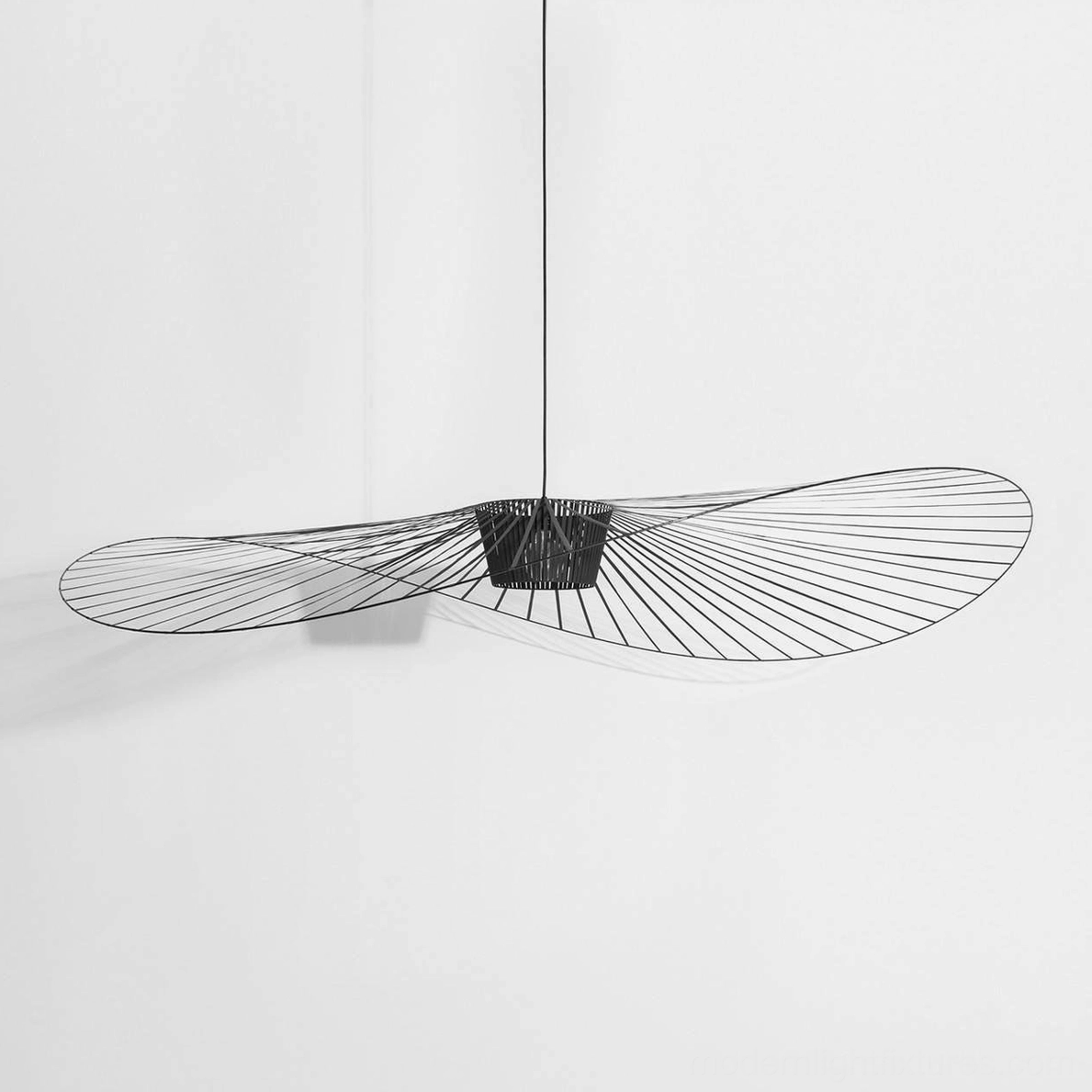 Woven fiber glass pendant lamp showing handcrafted variation in weave tension authenticity