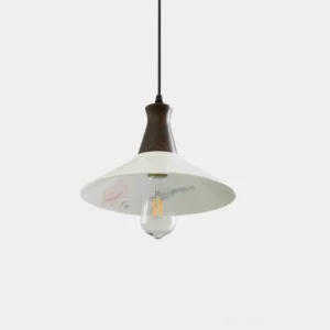 Linna handpainted floral ceramic pendant lamp with walnut wood top and cream shade featuring pink flower pattern, studio front view