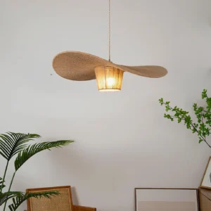 Artisan hemp rope pendant lamp suspended in wabi-sabi living space with green plants and natural rustic aesthetic