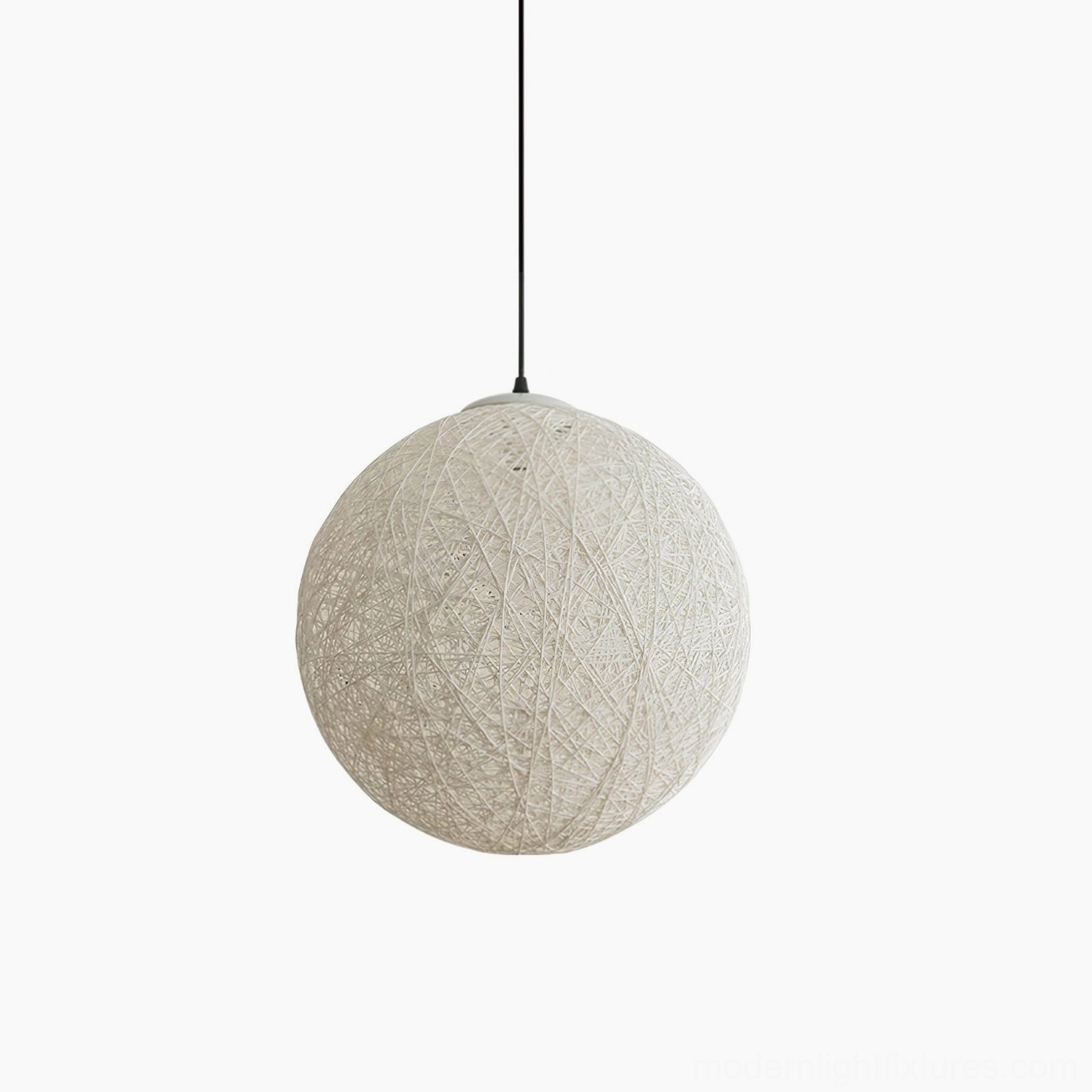 Beige handwoven hemp sphere pendant lamp in residential interior with warm color temperature illumination on wall