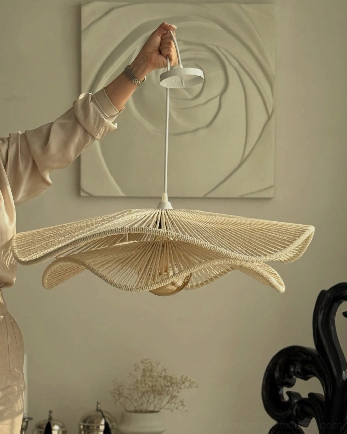 Close-up detail of handwoven hemp rope pendant light shade showing natural fiber texture, artisanal craftsmanship and boho material quality