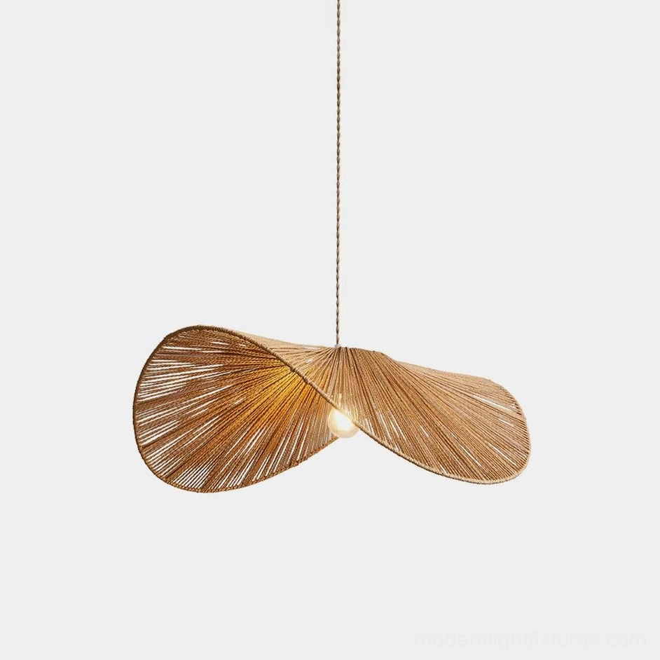 Handwoven hemp rope straw hat pendant light with natural brown braided rope construction on white background