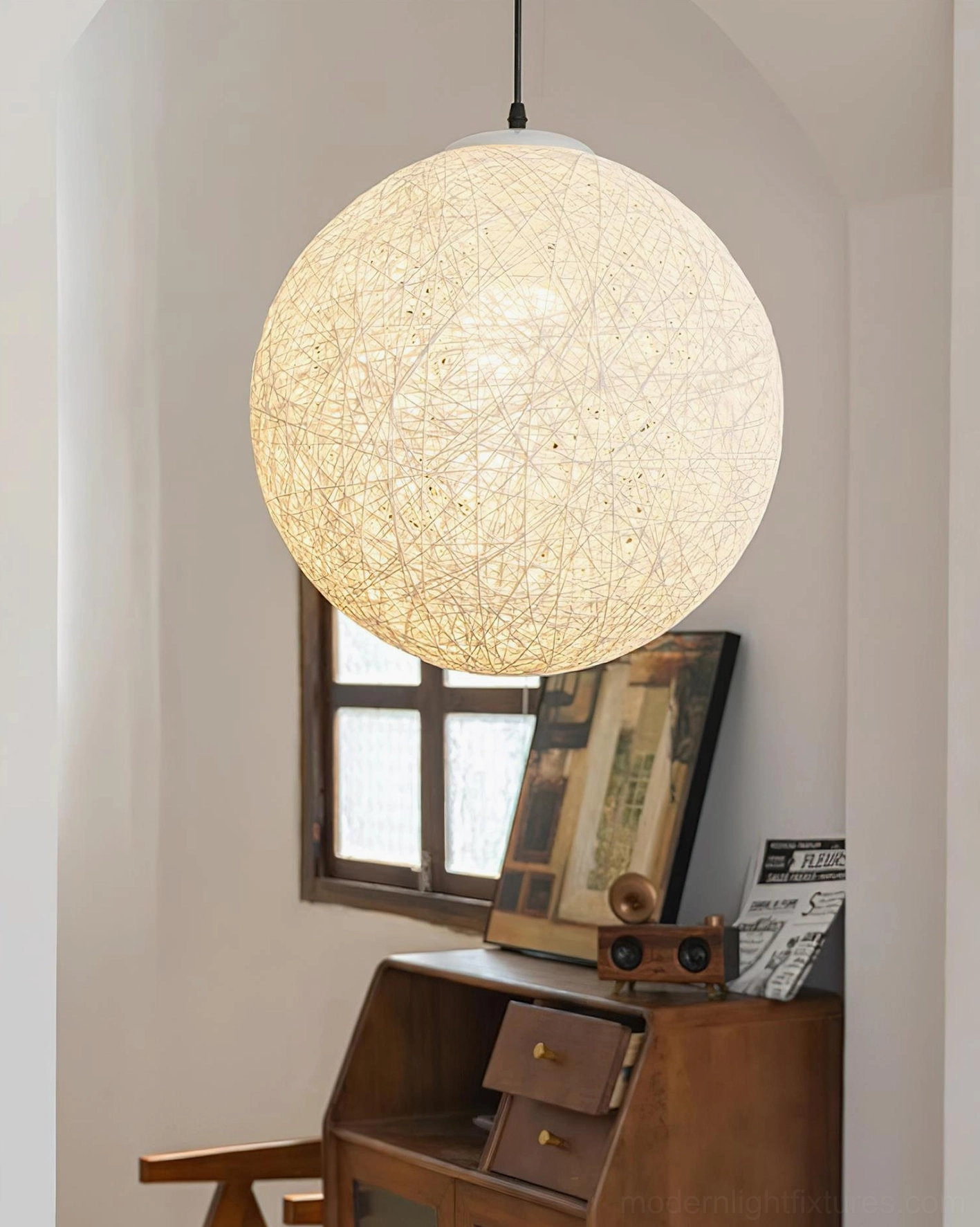 Handwoven hemp sphere pendant light full fixture view showing metal frame structure and hemp rattan weave composition