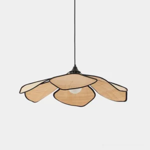 Handwoven raffia petal pendant light with black metal frame on white background, showcasing natural woven texture