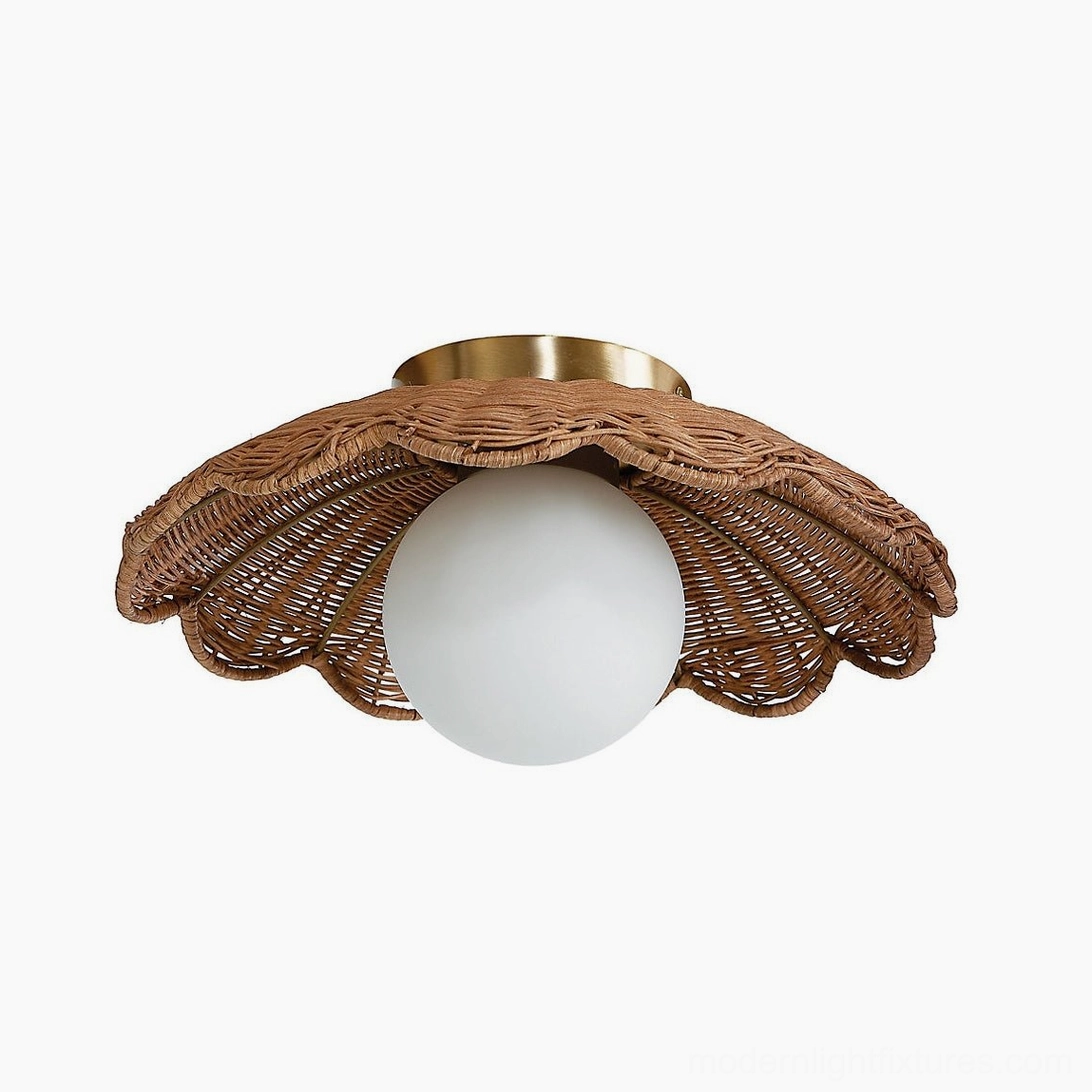 Hand-woven dark rattan scallop flush mount ceiling light - low angle studio view showing frame and brass mount
