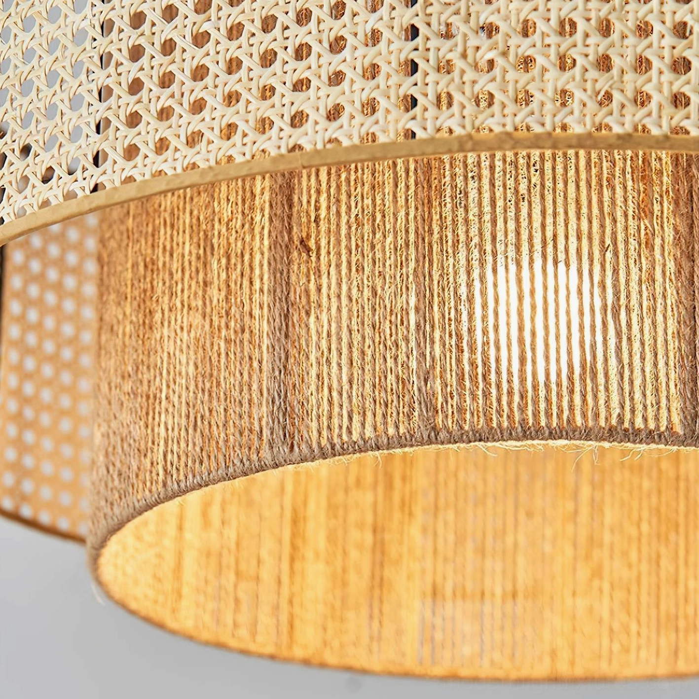 Handwoven rattan pendant lamp suspended in residential space, showcasing scale and proportion of 40cm diameter fixture