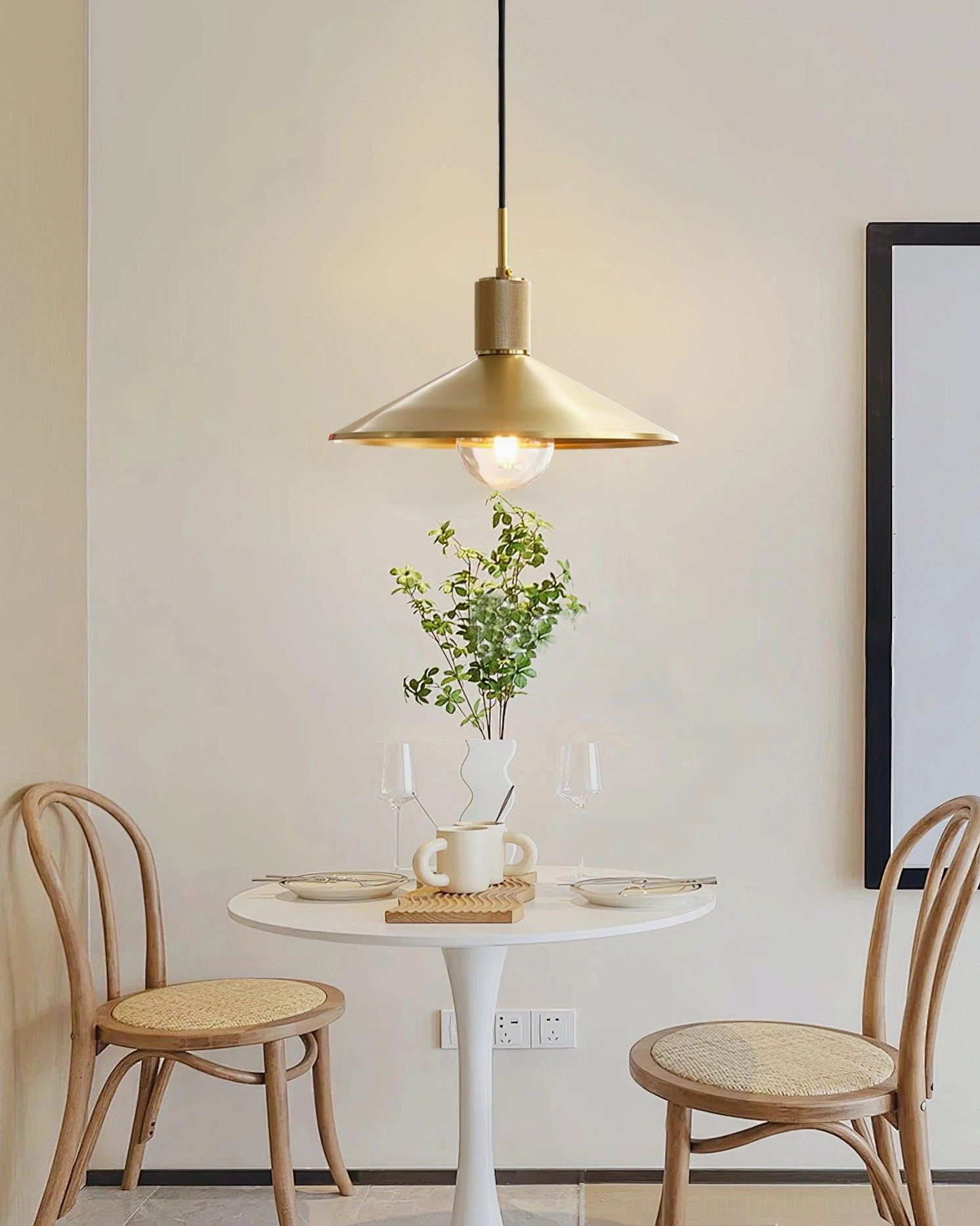 Hardwired brass pendant light with adjustable 150cm wire showing installation flexibility for various ceiling heights