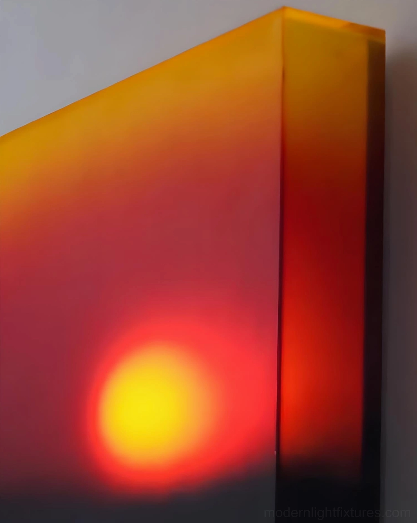 Hardwired wall sconce installation showing pull cord pendant details and square panel geometry