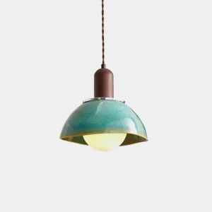Harley ceramic pendant light with walnut wood cap and teal speckled glaze, front overhead view on white background