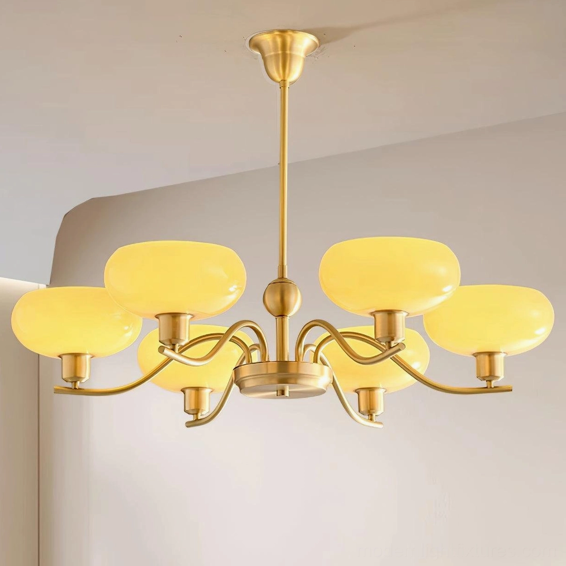 Havana 8-head mid-century modern chandelier installed in minimalist living room with warm ambient lighting