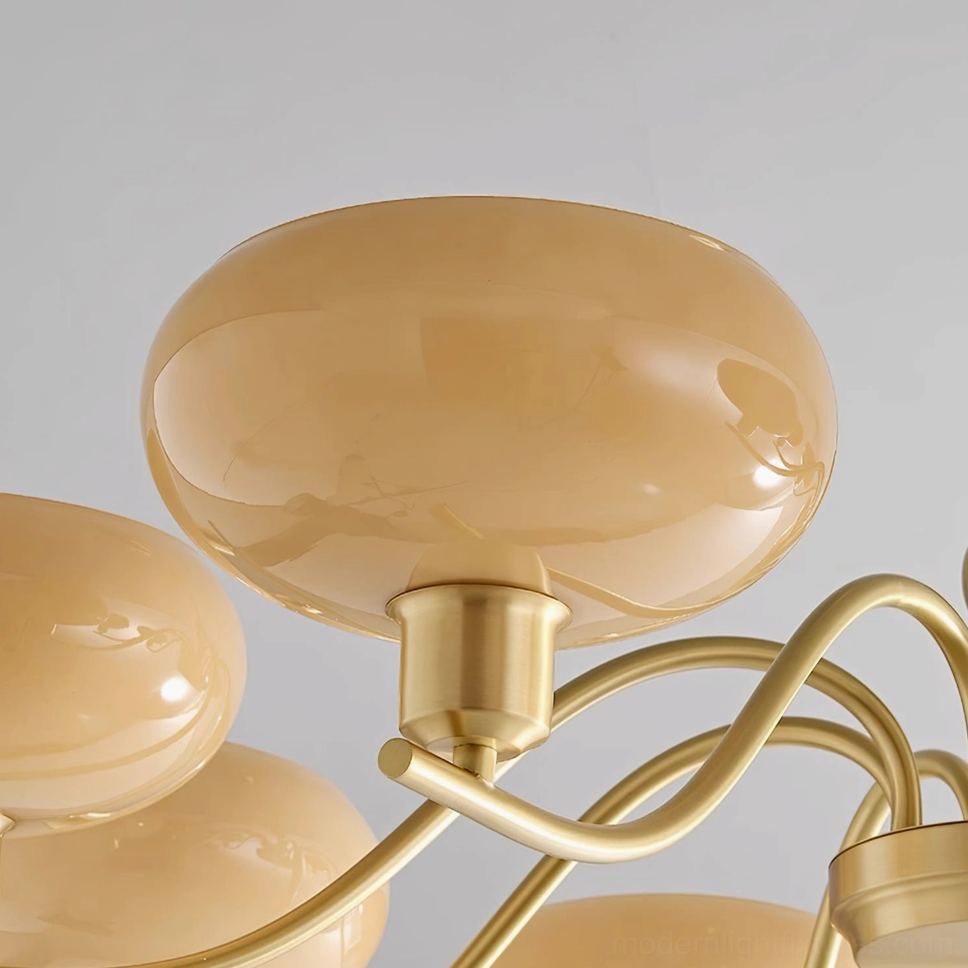 Havana multi-head pendant chandelier detail view of brass frame geometry and glass shade connection