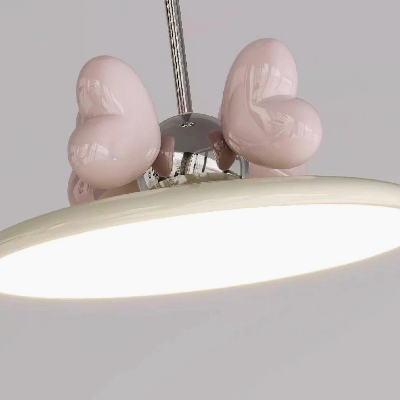 Heart pendant light with chrome finish and acrylic dome for modern interior design