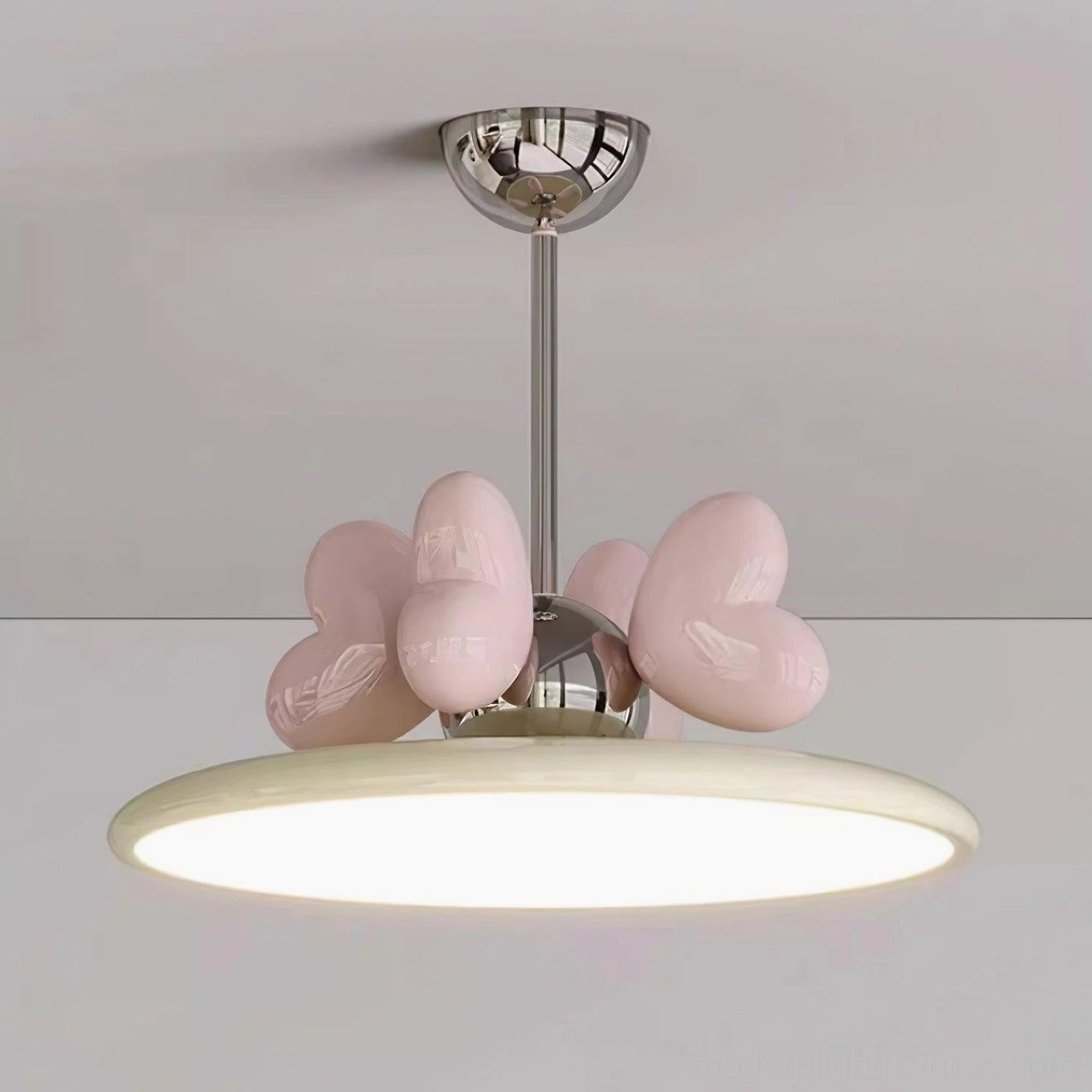 Heart pendant light design showing acrylic shade and metal resin construction
