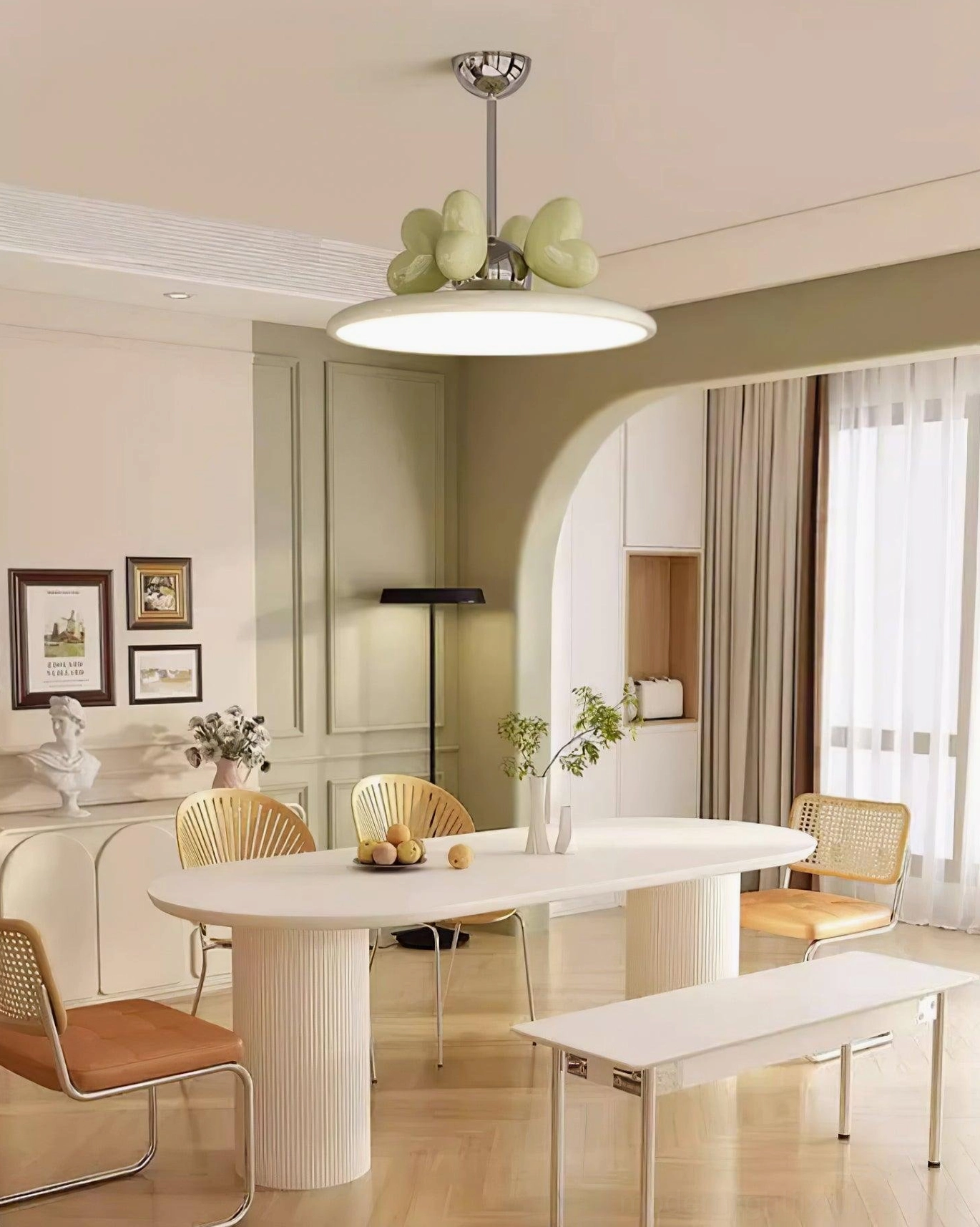 Heart pendant lamp with green heart decorations in modern light green dining room