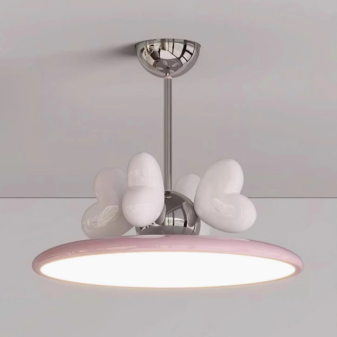 Modern pendant light with heart motif in Scandinavian interior setting