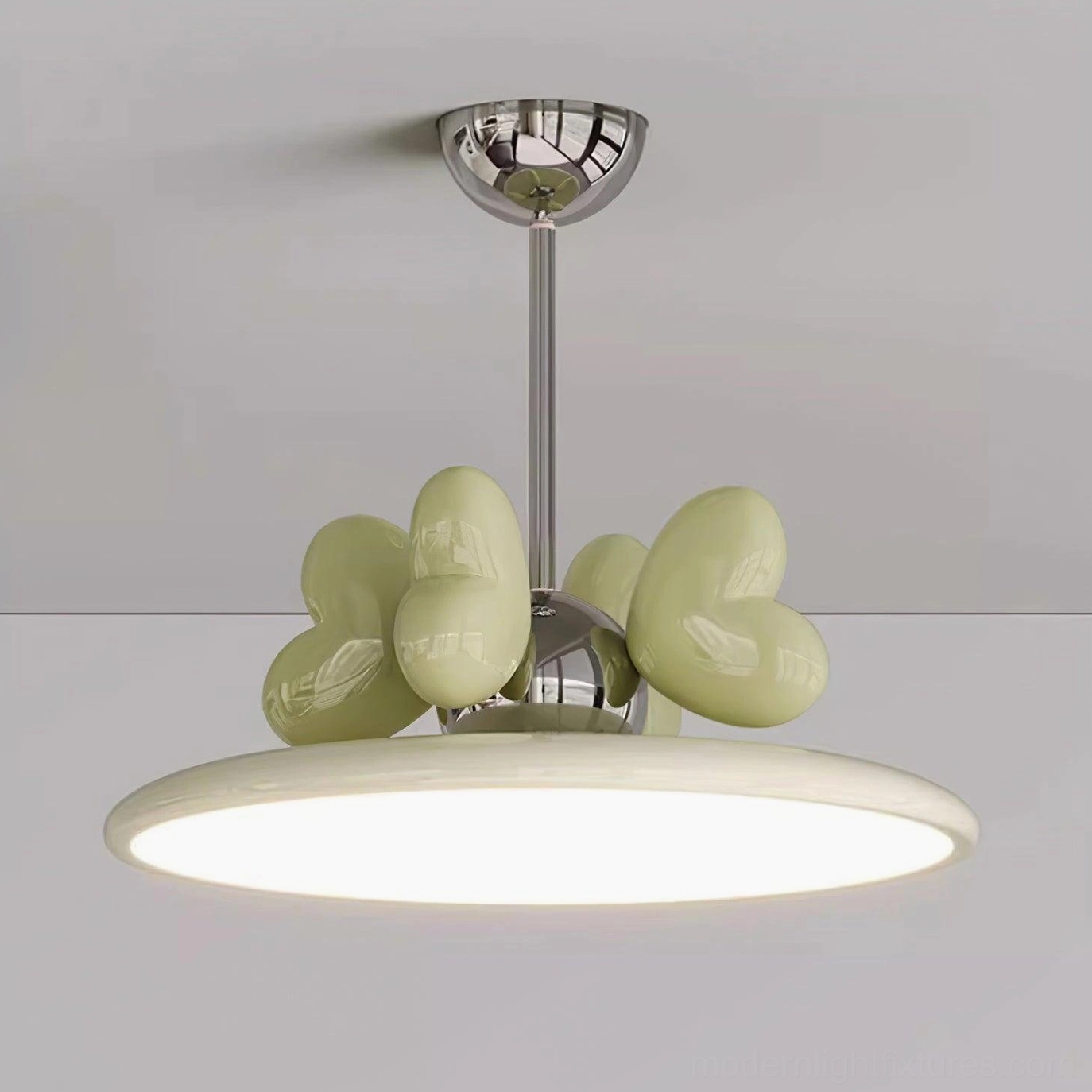 Contemporary heart pendant lamp demonstrating warm 3000K light quality indoors
