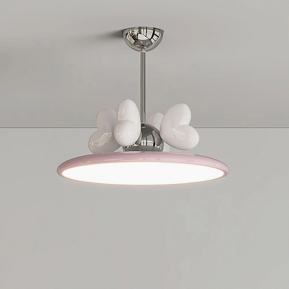 Modern heart pendant light with white and pink color combination hanging indoors