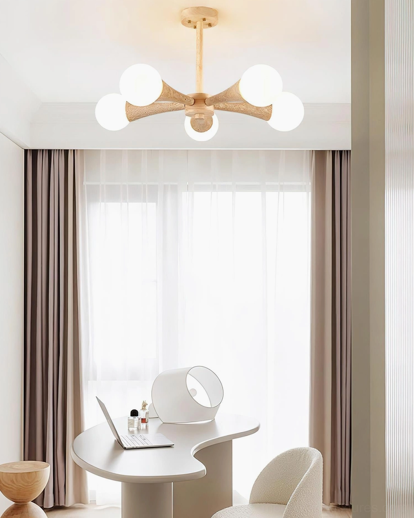 Hedra sculptural ceiling lamp illuminating minimalist study space with natural light