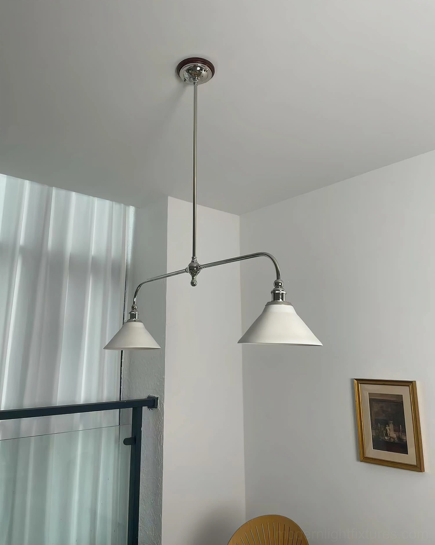 Heirloom linear chandelier with aged brass finish and white ceramic shades ideal for dining room and kitchen installation