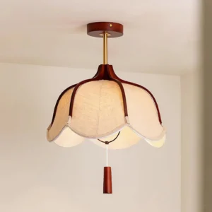 Helia 50cm fabric pendant light in residential interior, three-quarter view displaying warm ambient lighting and wood hardware details