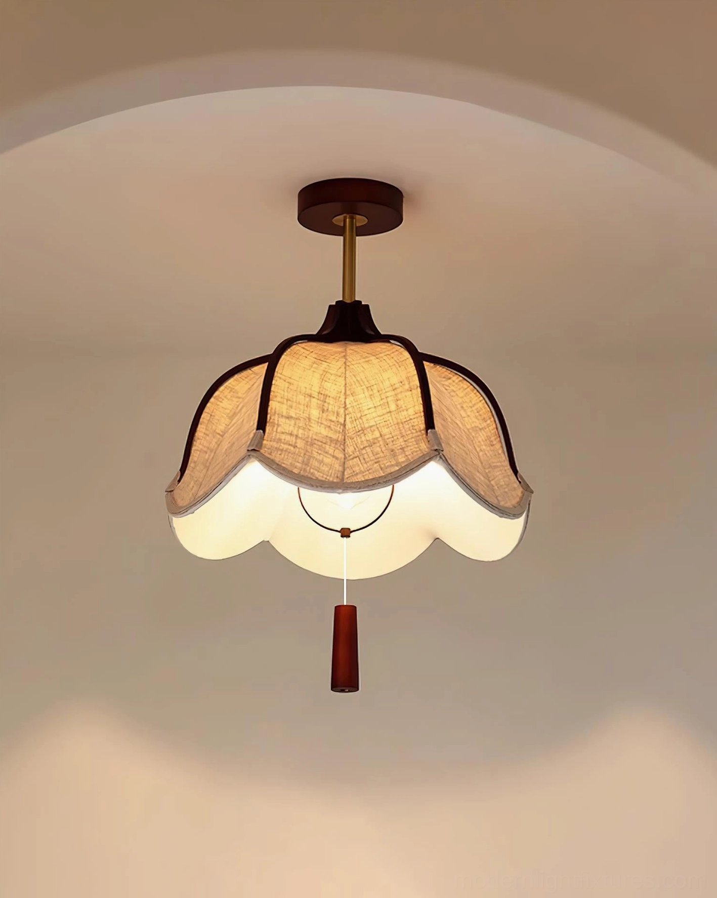 Helia ceiling fixture low-angle view in archway space, demonstrating soft warm glow on walls and architectural features
