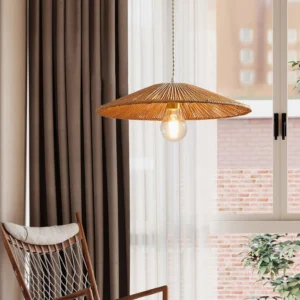 Bohemian rattan pendant light in living room with window and rocking chair, low angle view