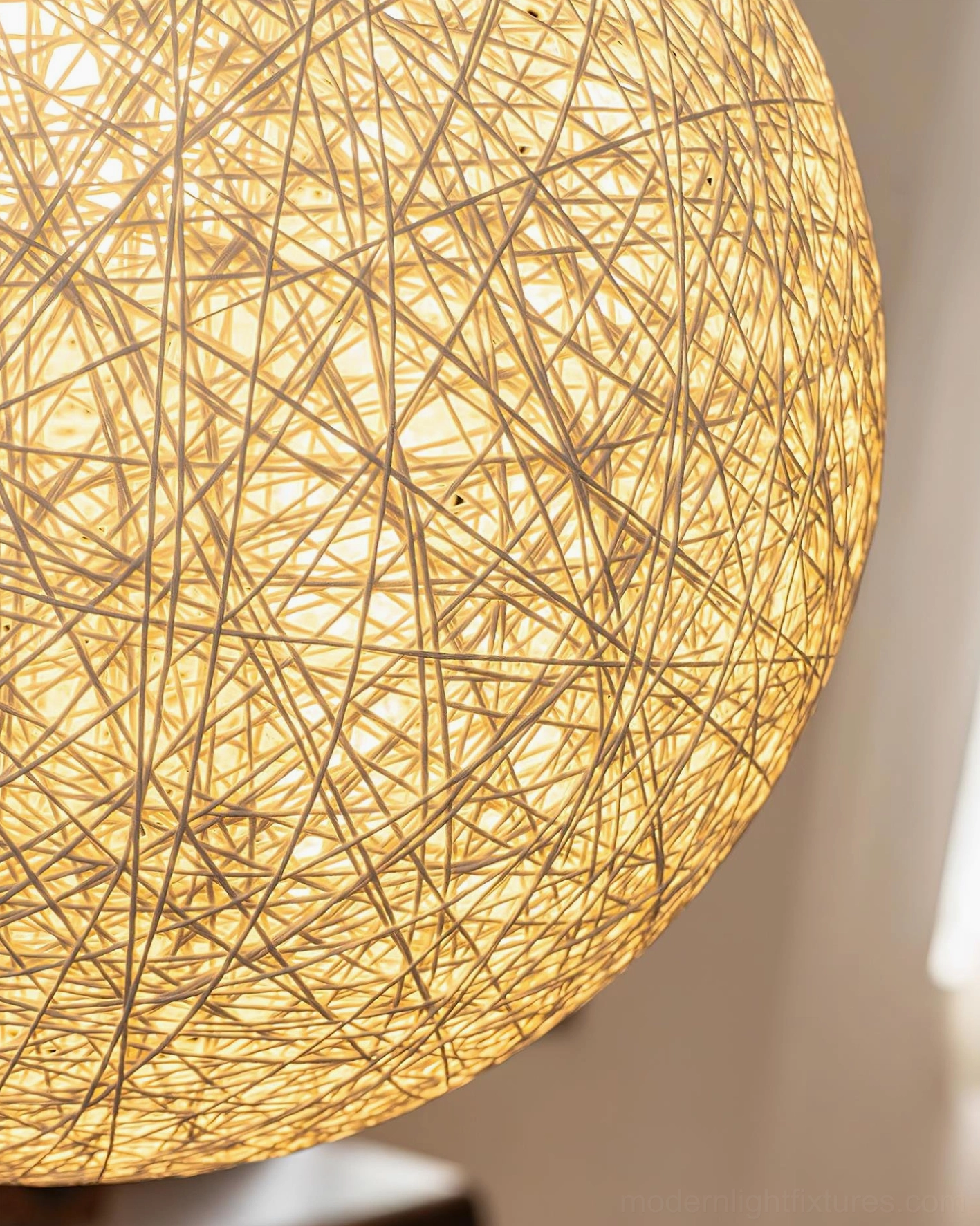 Off-white handwoven hemp sphere ceiling pendant light architectural detail showing suspension system and weave structure