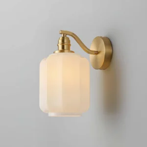 Brass and white glass Henry wall sconce - three-quarter angle showing elegant curved arm and glass diffuser