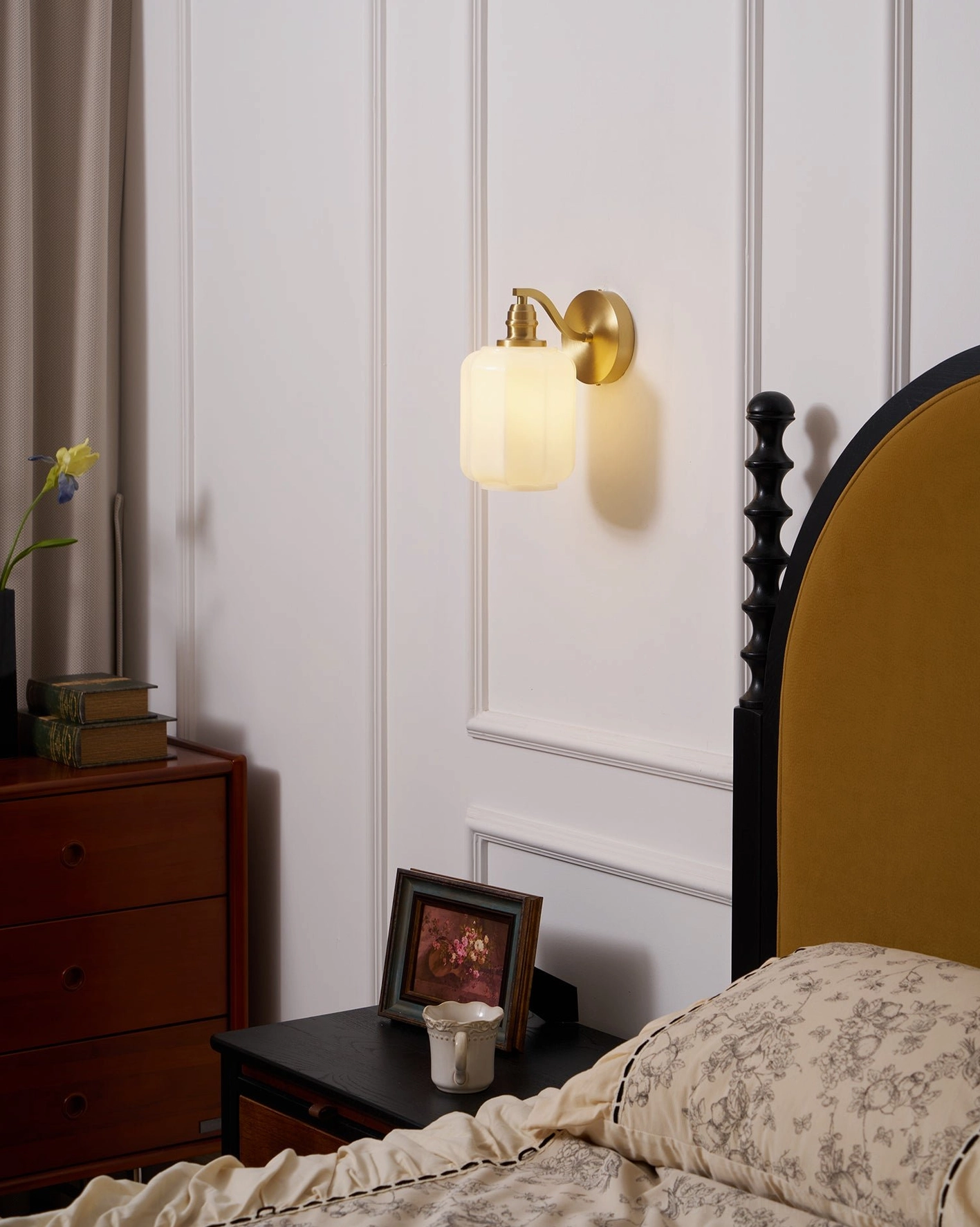 Henry brass wall sconce detail photograph showing brushed metal finish quality and glass shade precision