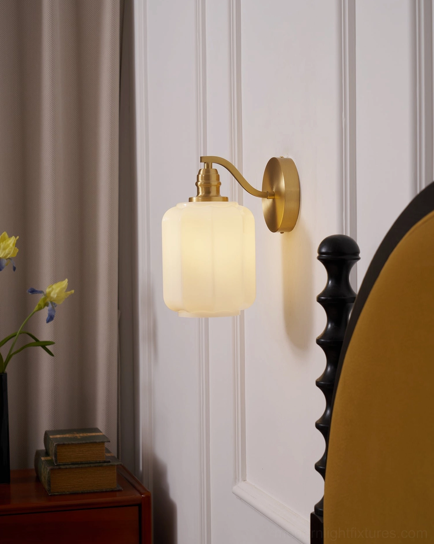 Henry brass wall sconce controlled dimming feature providing bright task light to intimate evening mood