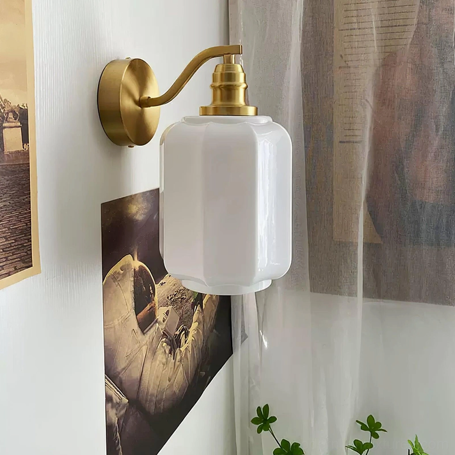 Henry wall sconce creating layered ambient light composition with ceiling fixtures in coordinated scheme