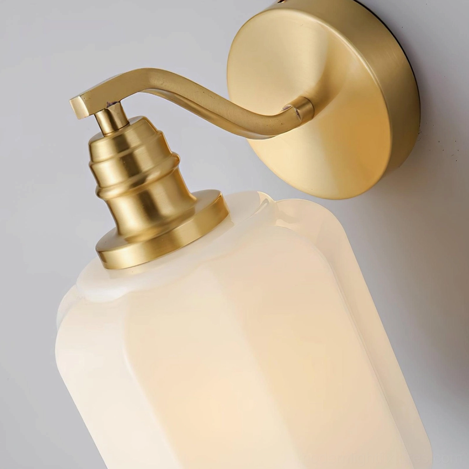 Henry wall sconce mounting bracket and backplate showing clean flush professional installation design