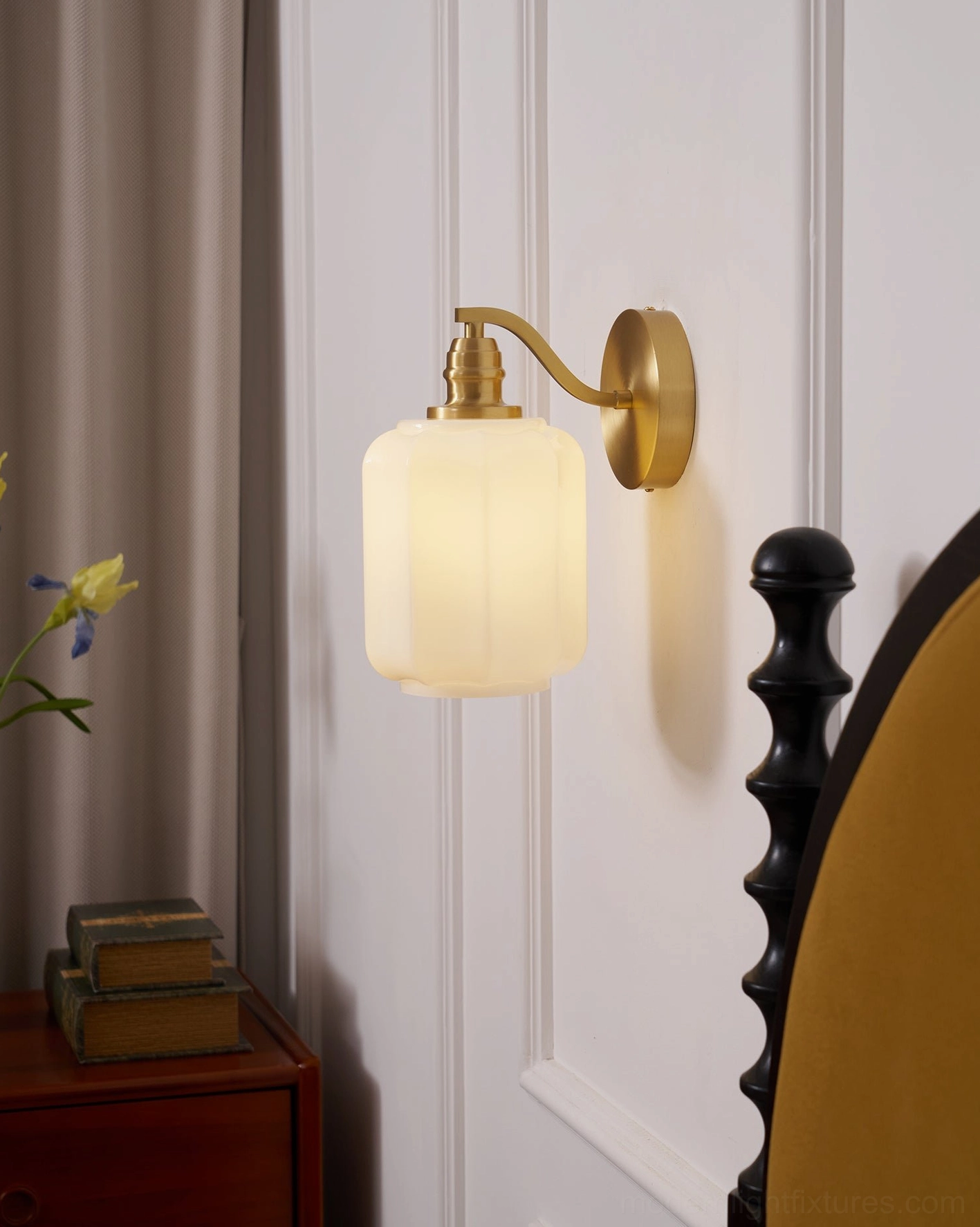 Henry wall sconce pair creating composed architectural presence in professionally designed bedroom space