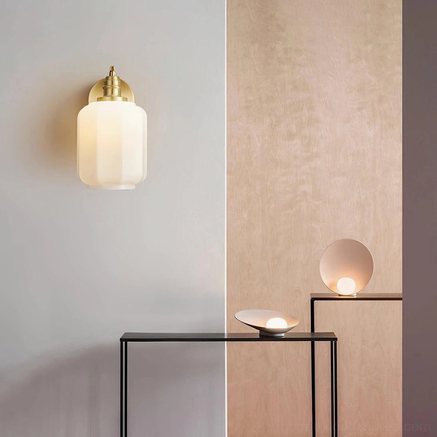 Henry wall sconces creating vertical visual interest in gallery wall arrangement with artwork display