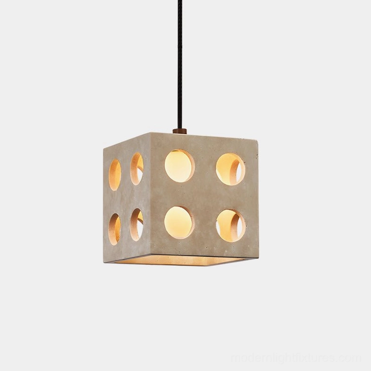 Hexa geometric cube pendant light with circular cutouts in beige travertine and glass, frontal studio view with warm illumination