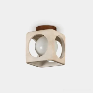 Hollowa travertine ceiling light fixture front view with geometric stone frame and glowing orb
