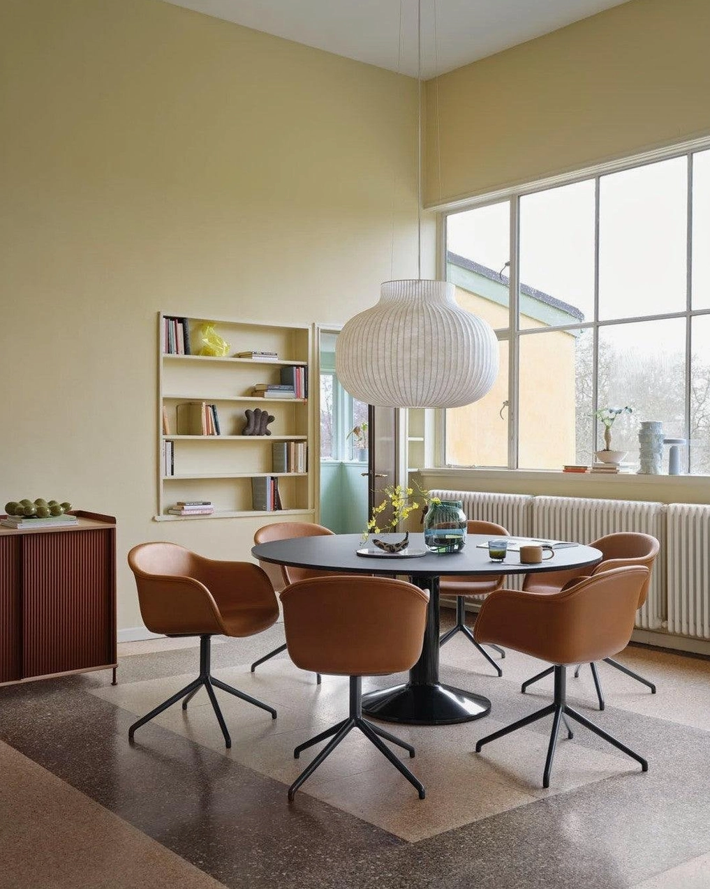 Contemporary pendant light installed in home office space combining task and ambient lighting