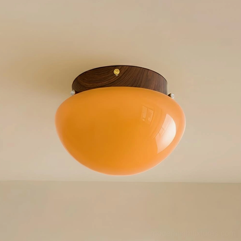 Honeyed Dome ceiling light in walnut color option creating classic warm lighting ambiance in living space