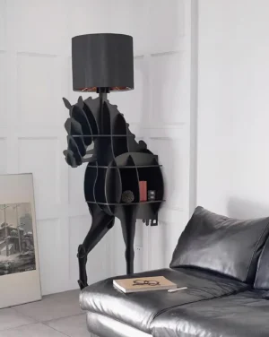 Horse-shaped floor lamp with integrated storage shelf beside leather sofa in modern living room - contemporary lighting design