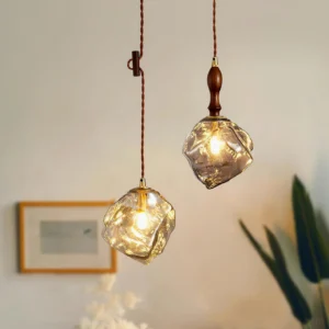 Pair of ice cubes pendant lights in amber and smoky grey, interior dining room installation