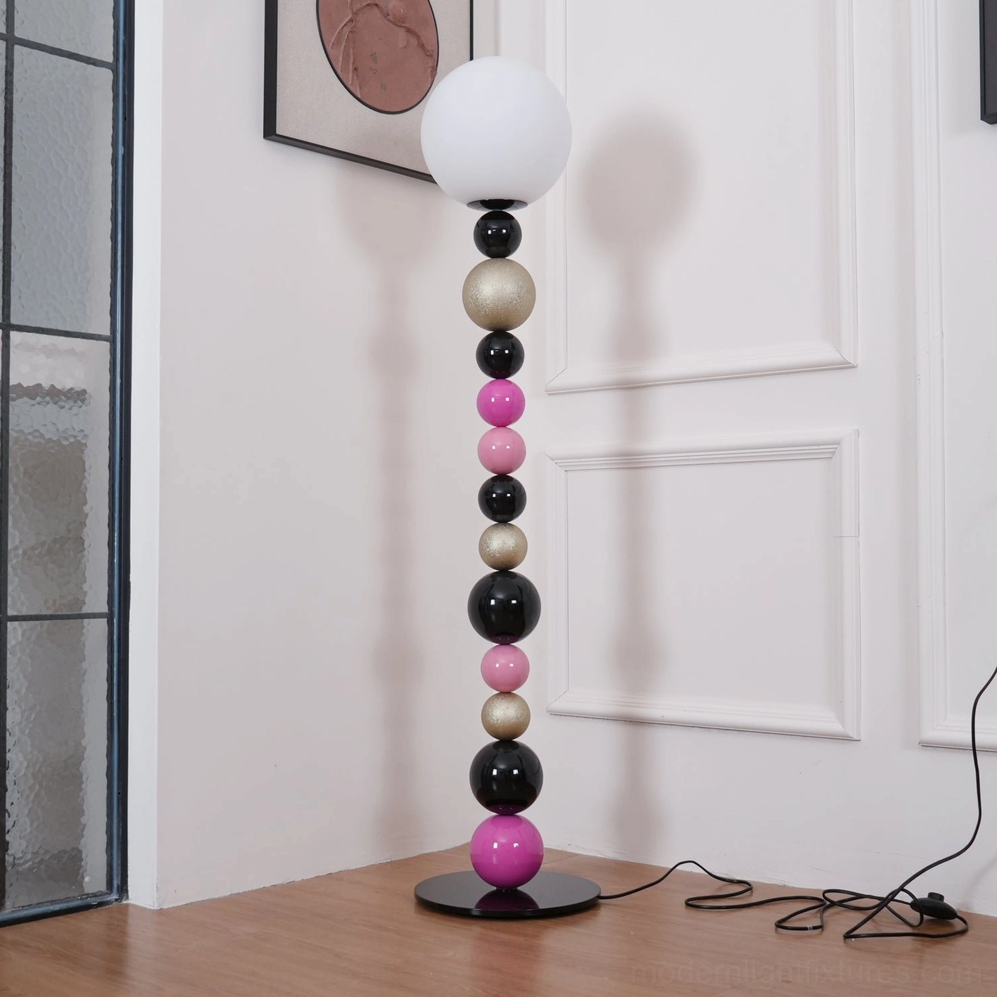 Contemporary multicolor beaded ball lamp illuminated in modern living space, warm ambient lighting