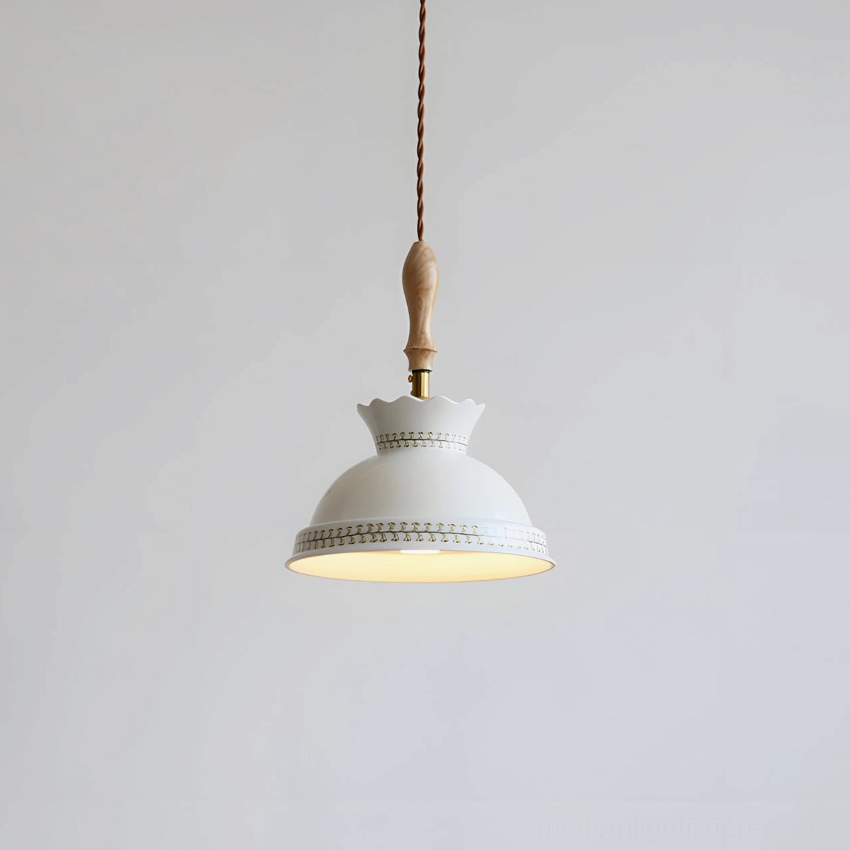 Illuminated ceramic pendant lamp with embossed decorative rim and wood brass suspension hardware